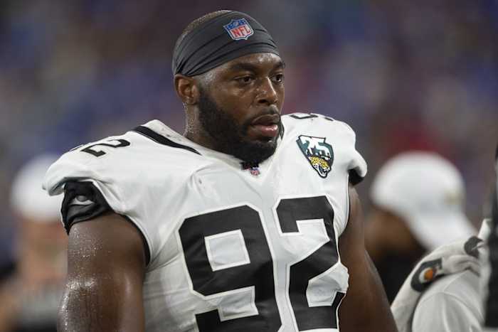 Jacksonville Jaguars defensive end Lyndon Johnson (92) stands on the sidelines during the during the second half of the game against the Baltimore Ravens at M&T Bank Stadium.